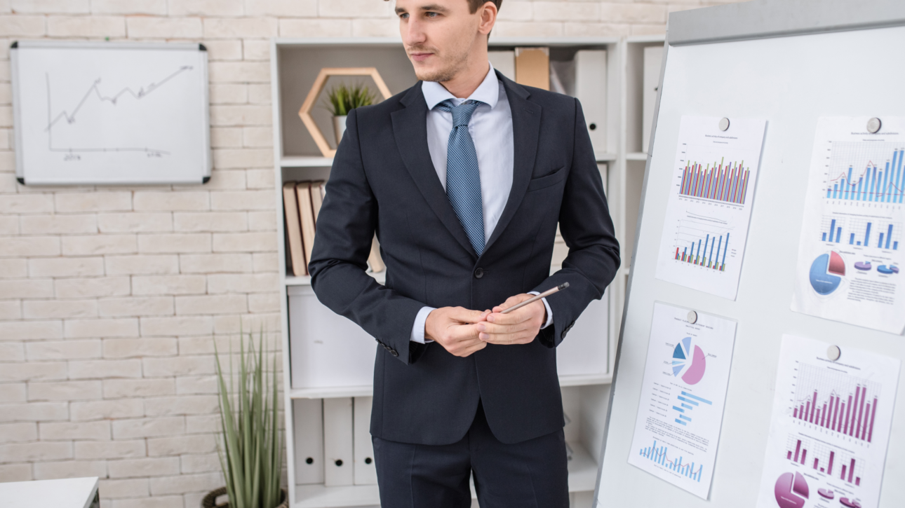 handsome-business-coach-in-seminar-U9XEDKS